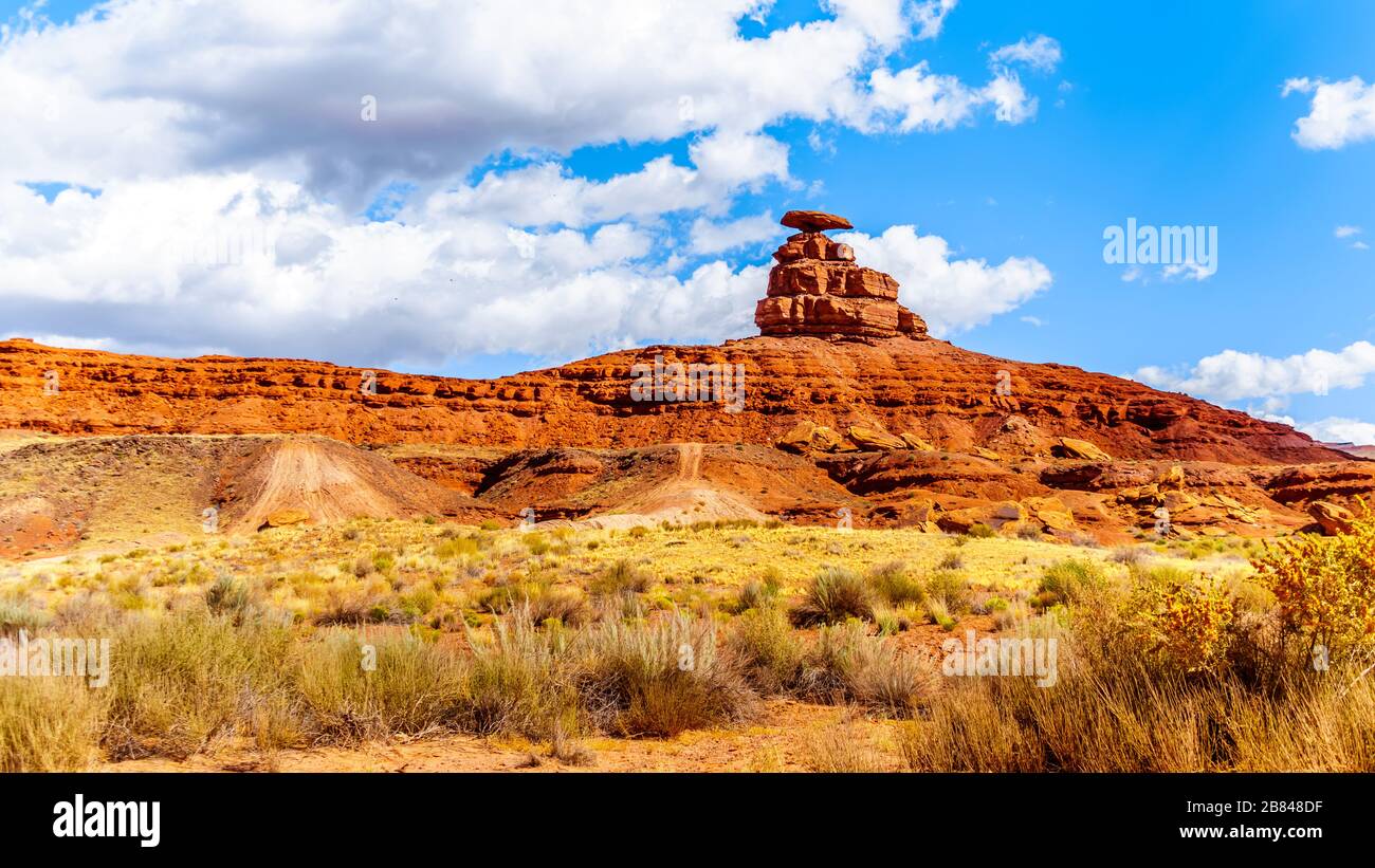 The sombrero-shaped rock outcropping on the northeast edge of the town named Mexican Hat, Utah, USA Stock Photo