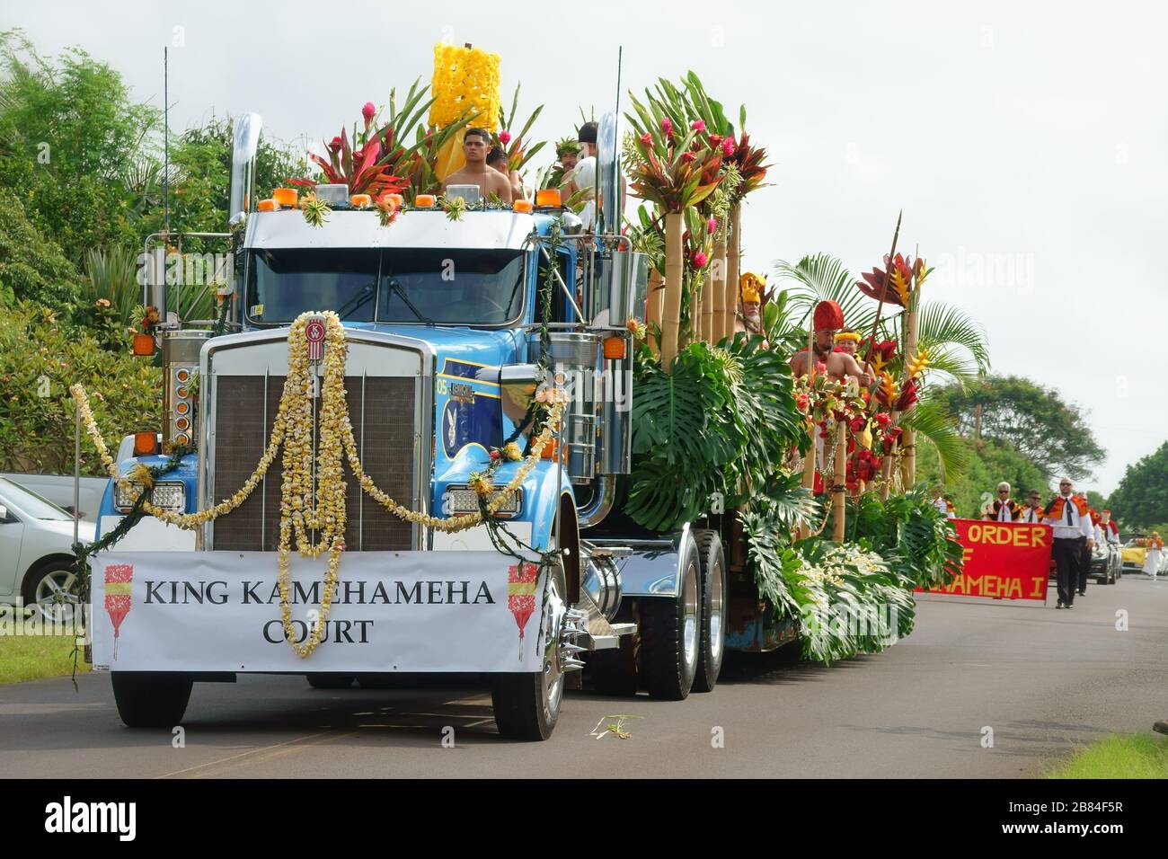 Lihue, Kauai, Hawaii / USA - June 9, 2018: The King Kamehameha Parade Court is shown on a decorated semi truck flatbed trailer during the annual event. Stock Photo