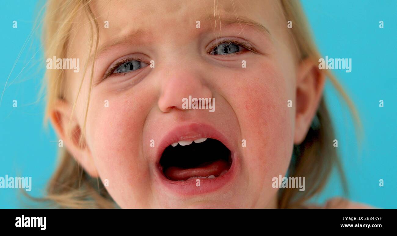 One-year-old baby cries close-up Stock Photo