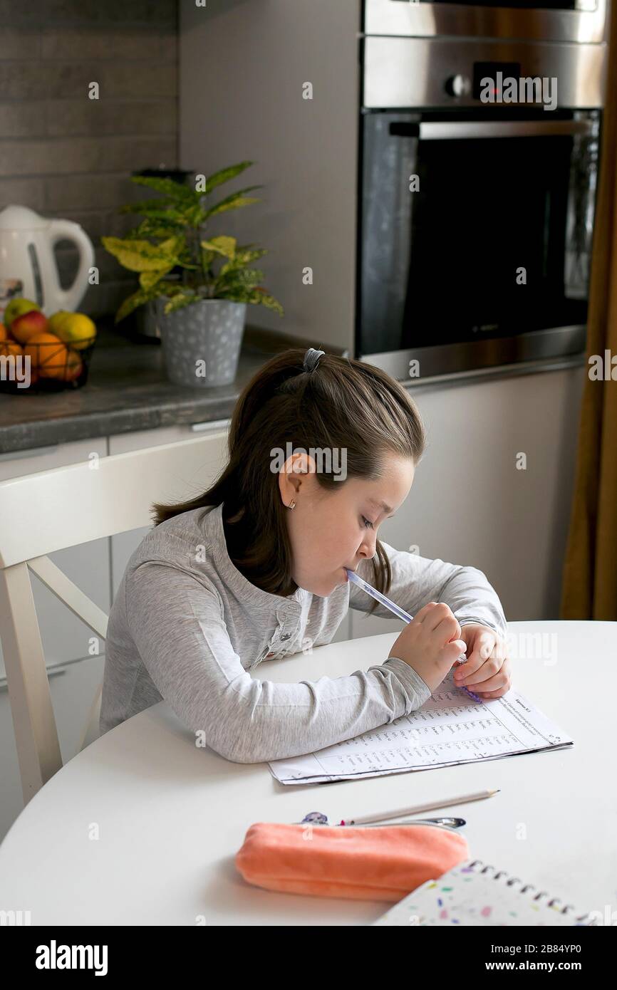 Pretty Cute Schoolgirl 7 8 Years Old Studying At Home Home School Online Education Home Education Quarantine Coronavirus Concept Stock Photo Alamy