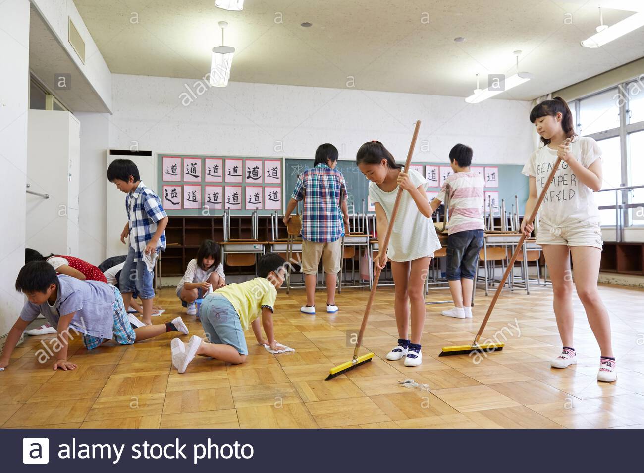 Student Cleaning Classroom High Resolution Stock Photography and Images