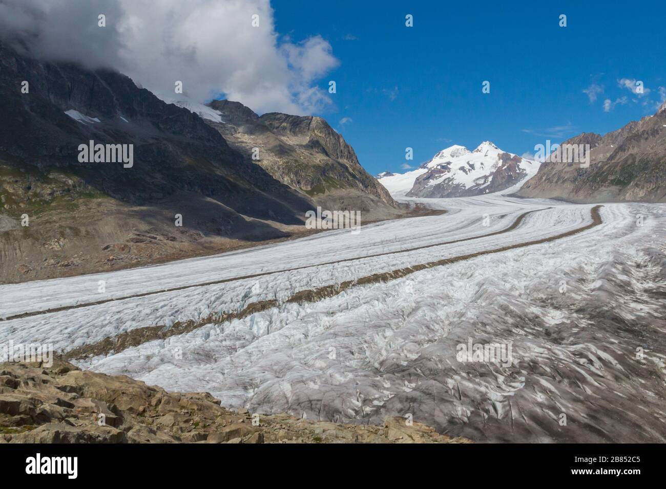 Aletsch glacier in alpine mountain landscape in Switzerland, blue sky Stock Photo