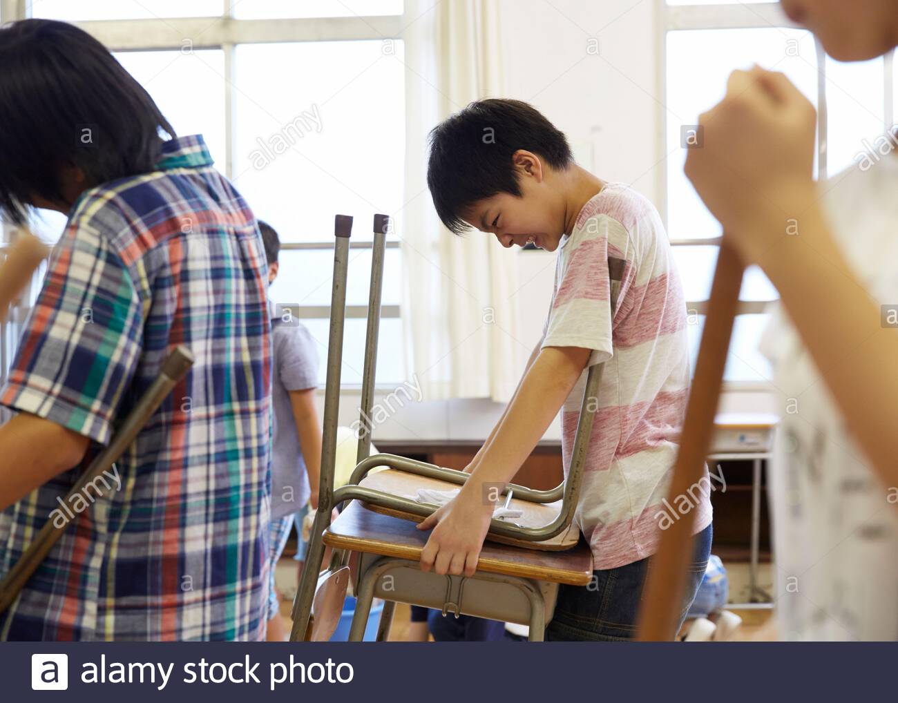 Student Cleaning Classroom High Resolution Stock Photography and Images
