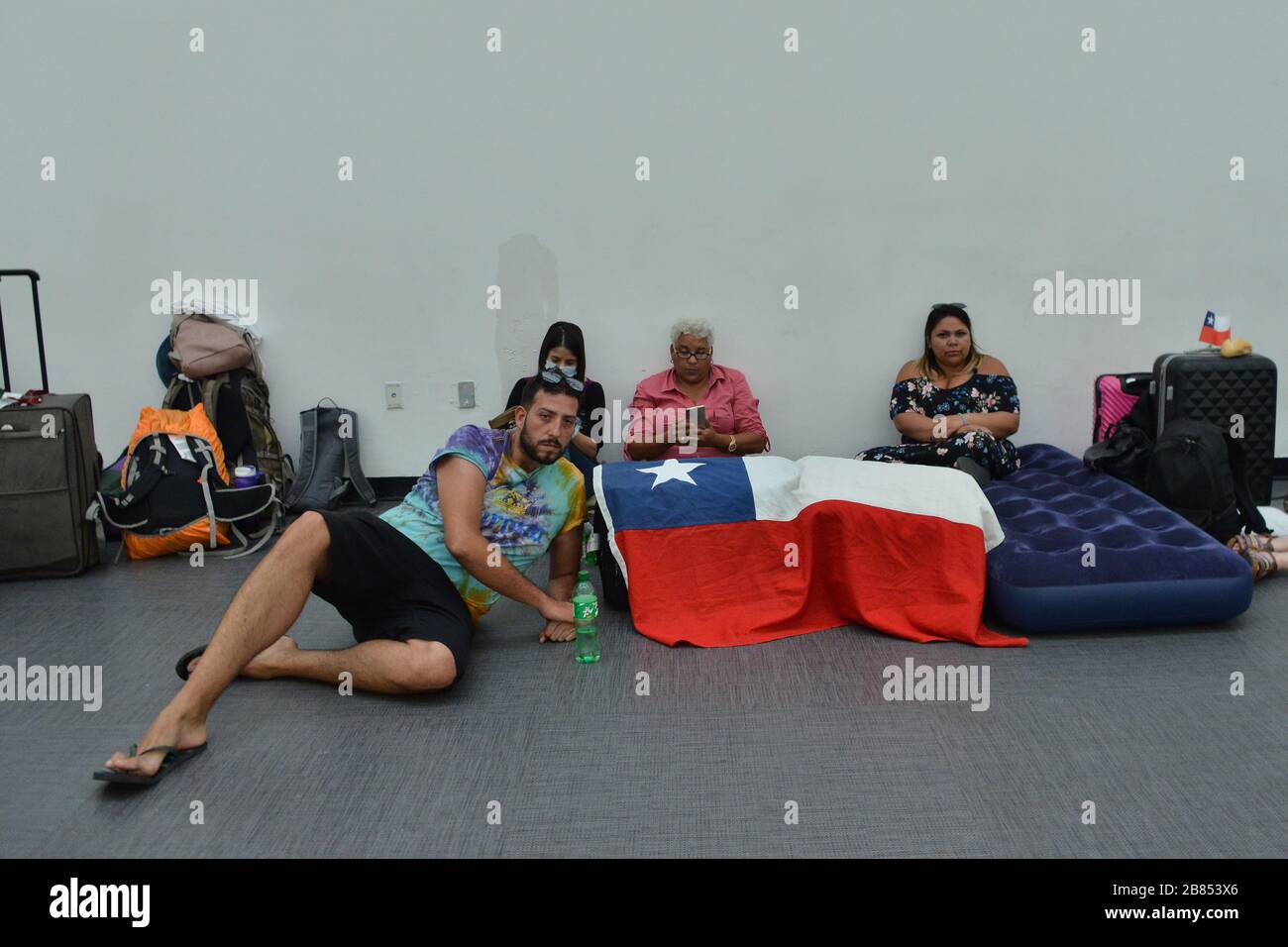 Mexico City, Mexico. 19th Mar, 2020. Chileans passengers are seen stranded at Mexico's International Airport because coronavirus outbreak has terrified the country for the pandemic crisis in Mexico City, Mexico (Photo by Carlos Tischler/Eyepix Group/Pacific Press) Credit: Pacific Press Agency/Alamy Live News Stock Photo