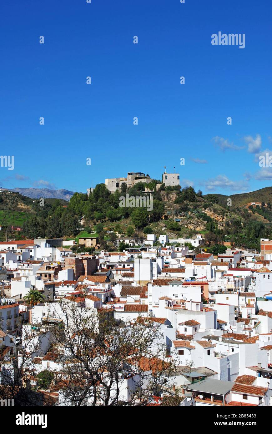 General view of the town with the castle on the hilltop, Monda, Malaga Province, Andalusia, Spain, Western Europe. Stock Photo
