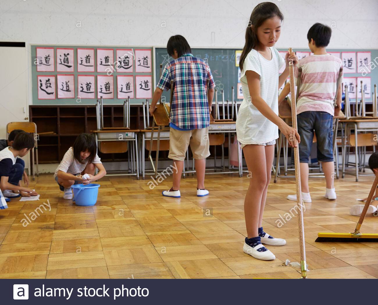 Student Cleaning Classroom High Resolution Stock Photography and Images