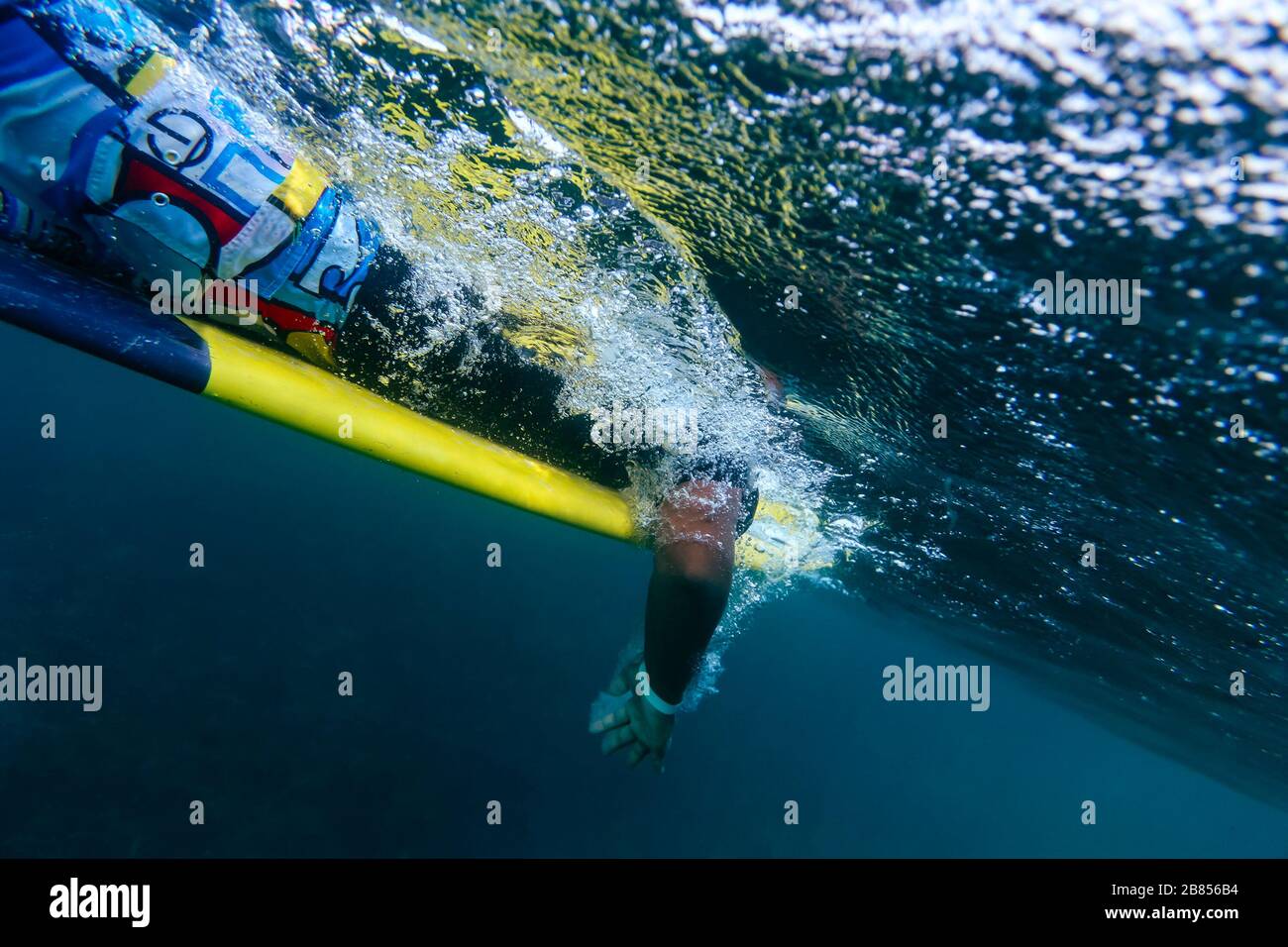 Surfer lying on board hi-res stock photography and images - Alamy