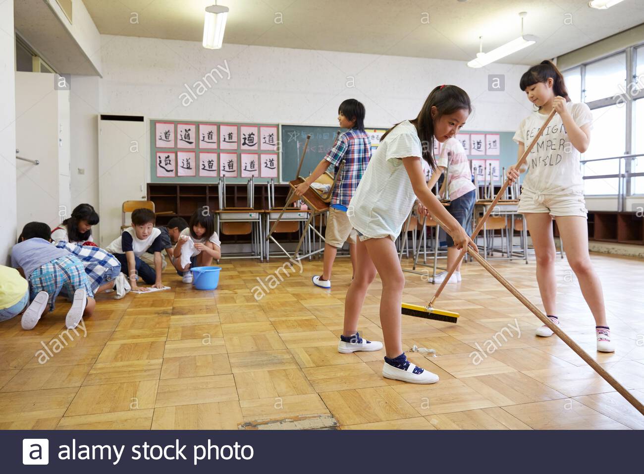 Student Cleaning Classroom High Resolution Stock Photography and Images