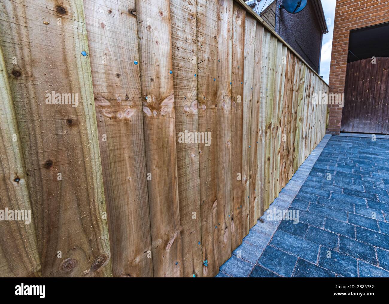 Landscape gardening - Block Driveway & fencing Stock Photo