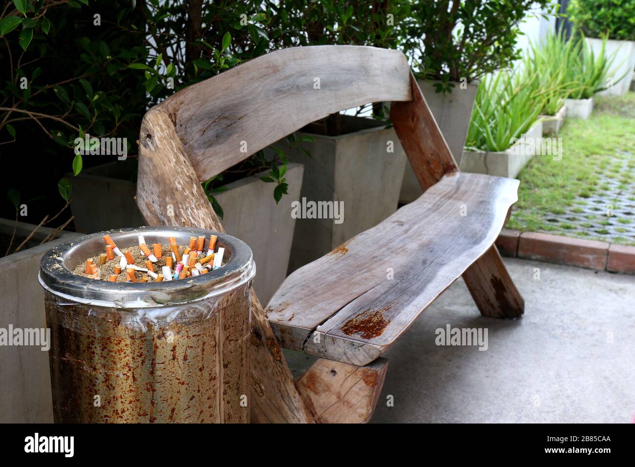 Smoking area, Ashtray bin trash and dirt, Smoking causes lung cancer and allergies Stock Photo