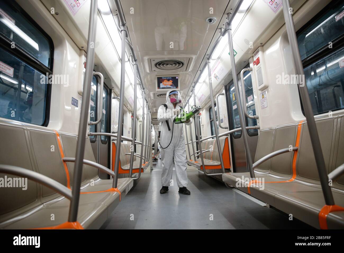 Mexico City, Mexico. 19th Mar, 2020. A staff member disinfects a subway train in Mexico City, Mexico, March 19, 2020. Mexico's Health Ministry confirmed the country's first death of COVID-19, a 41-year-old man who suffered from diabetes. Mexico has 118 confirmed cases of the virus, according to the last ministry report issued on Wednesday. Credit: Francisco Canedo/Xinhua/Alamy Live News Stock Photo