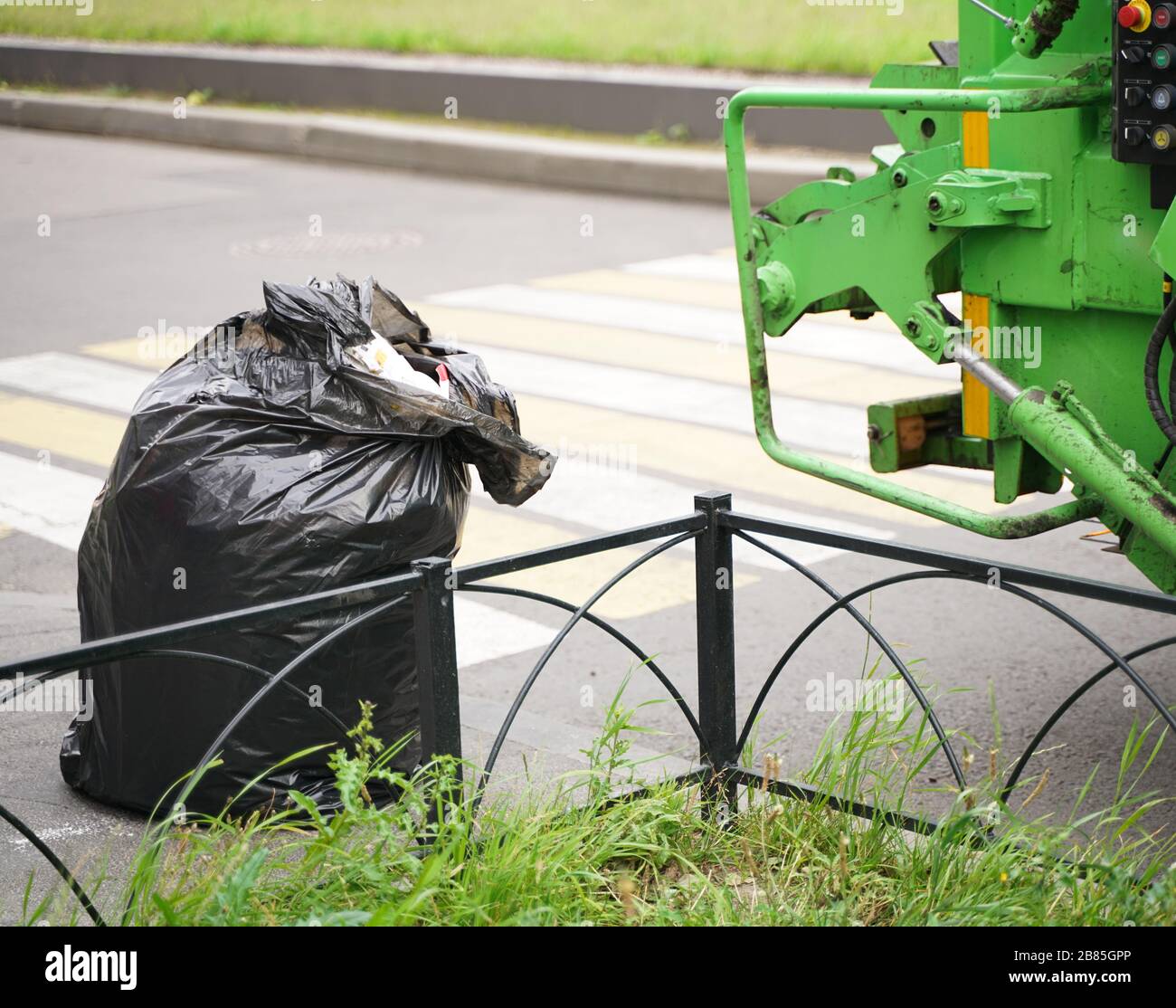 Green Garbage truck into waste emptying for waste disposal, Garbages creates environmental
