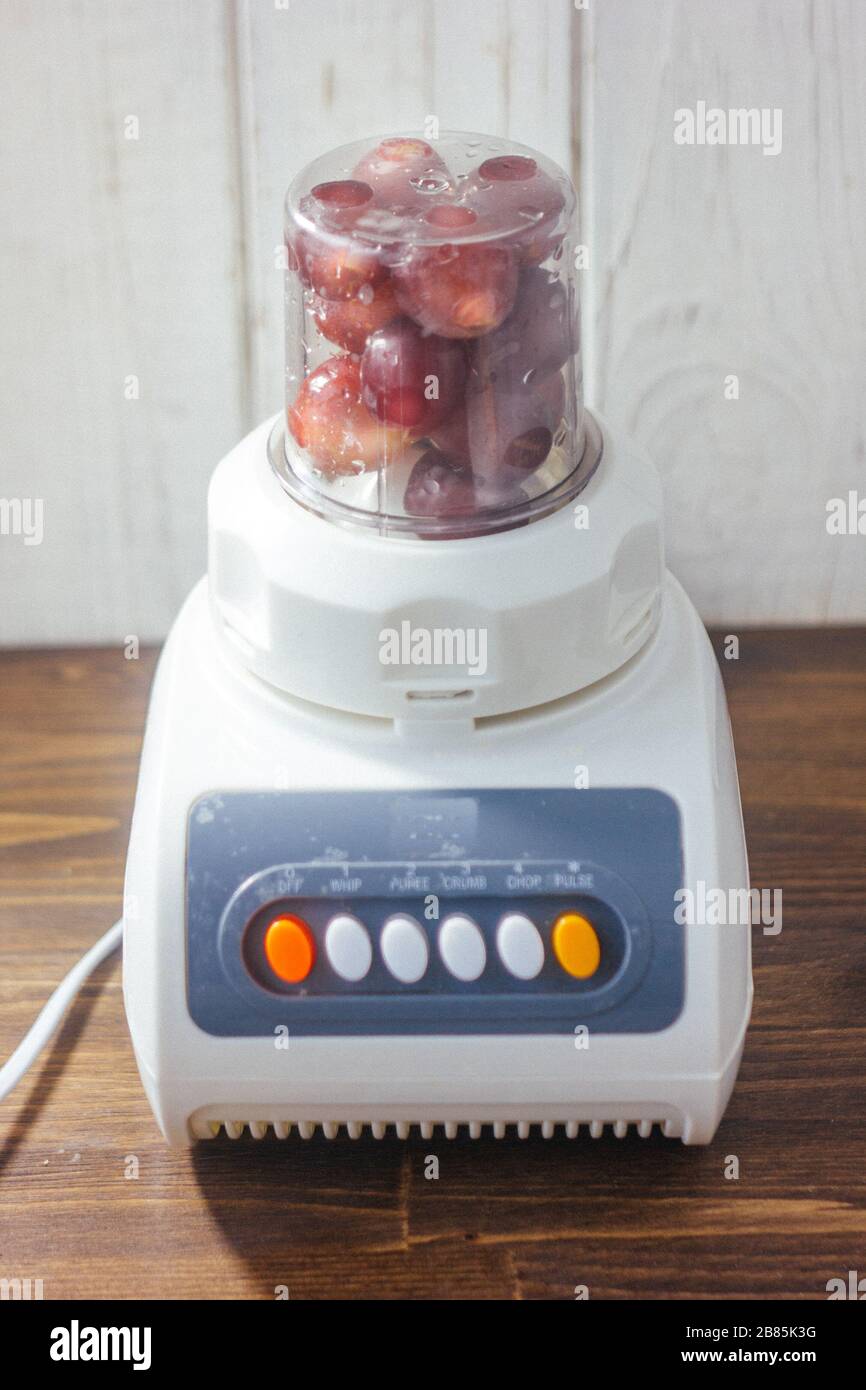 Fresh grapes in a blender, ready to mixing Stock Photo Alamy