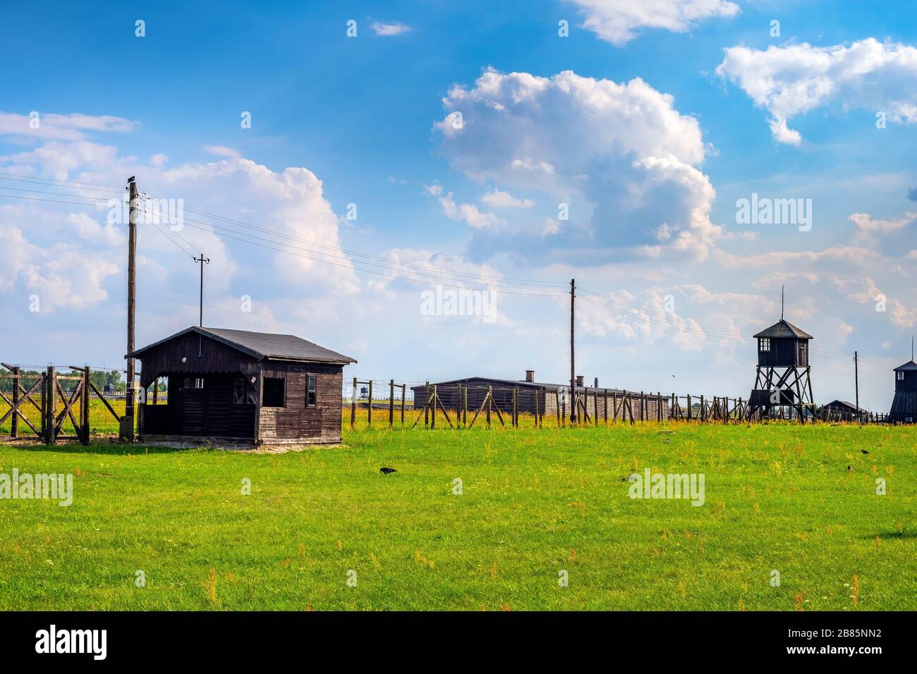 Lublin, Lubelskie / Poland - 2019/08/17: Panoramic view of the Majdanek KL Lublin Nazis concentration camp with guards towers and barbed-wire fences Stock Photo