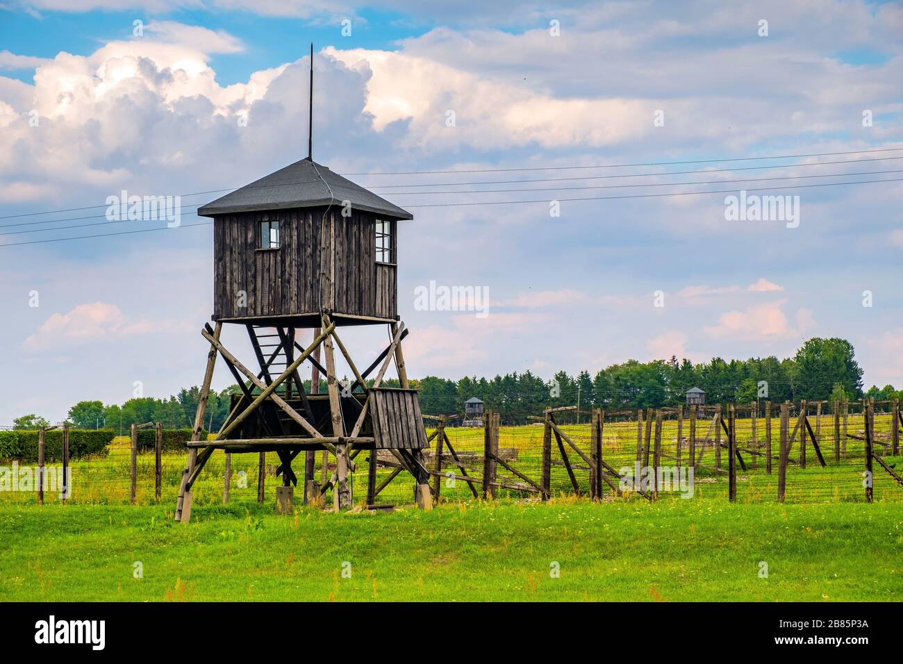 Lublin, Lubelskie / Poland - 2019/08/17: Guards towers and barbed-wire fences of Majdanek KL Lublin Nazis concentration and extermination camp Stock Photo