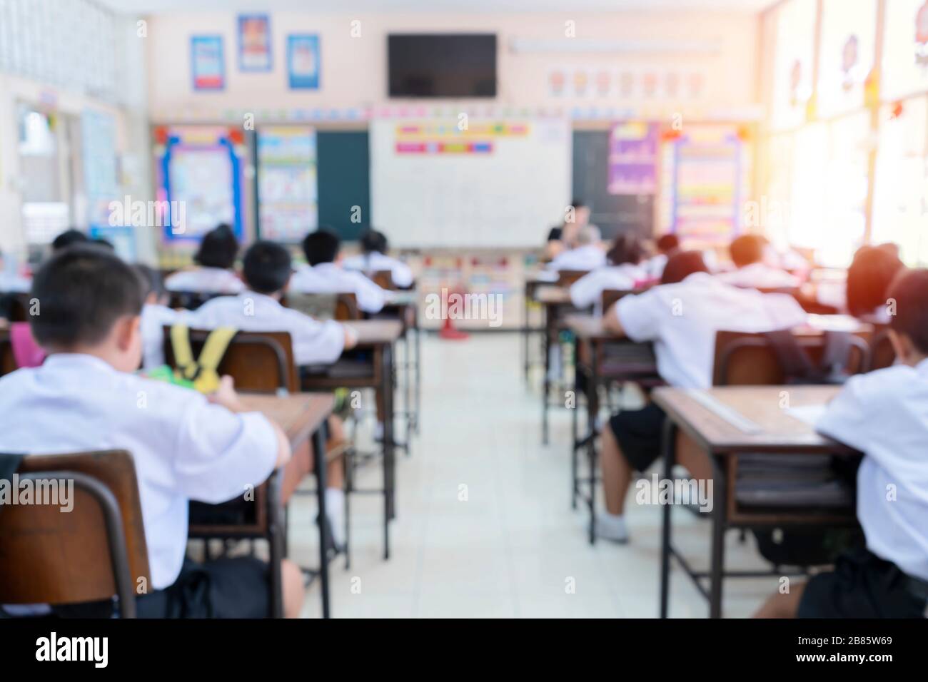 Education concept. The classroom blur, the classroom environment in which  the students are intending to study seriously Stock Photo - Alamy