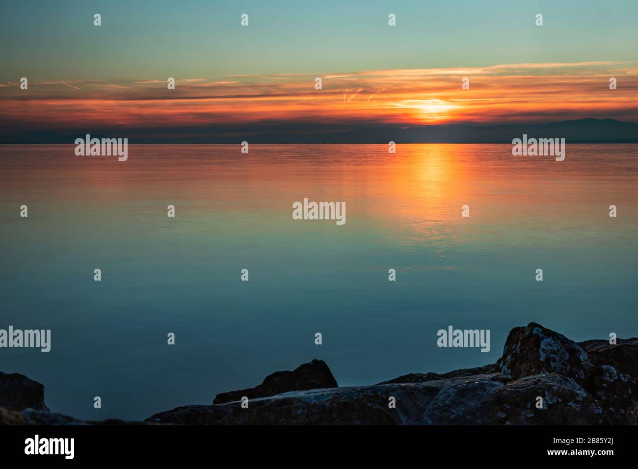 Beautiful sunset on the lake in Lausanne Switzerland Stock Photo