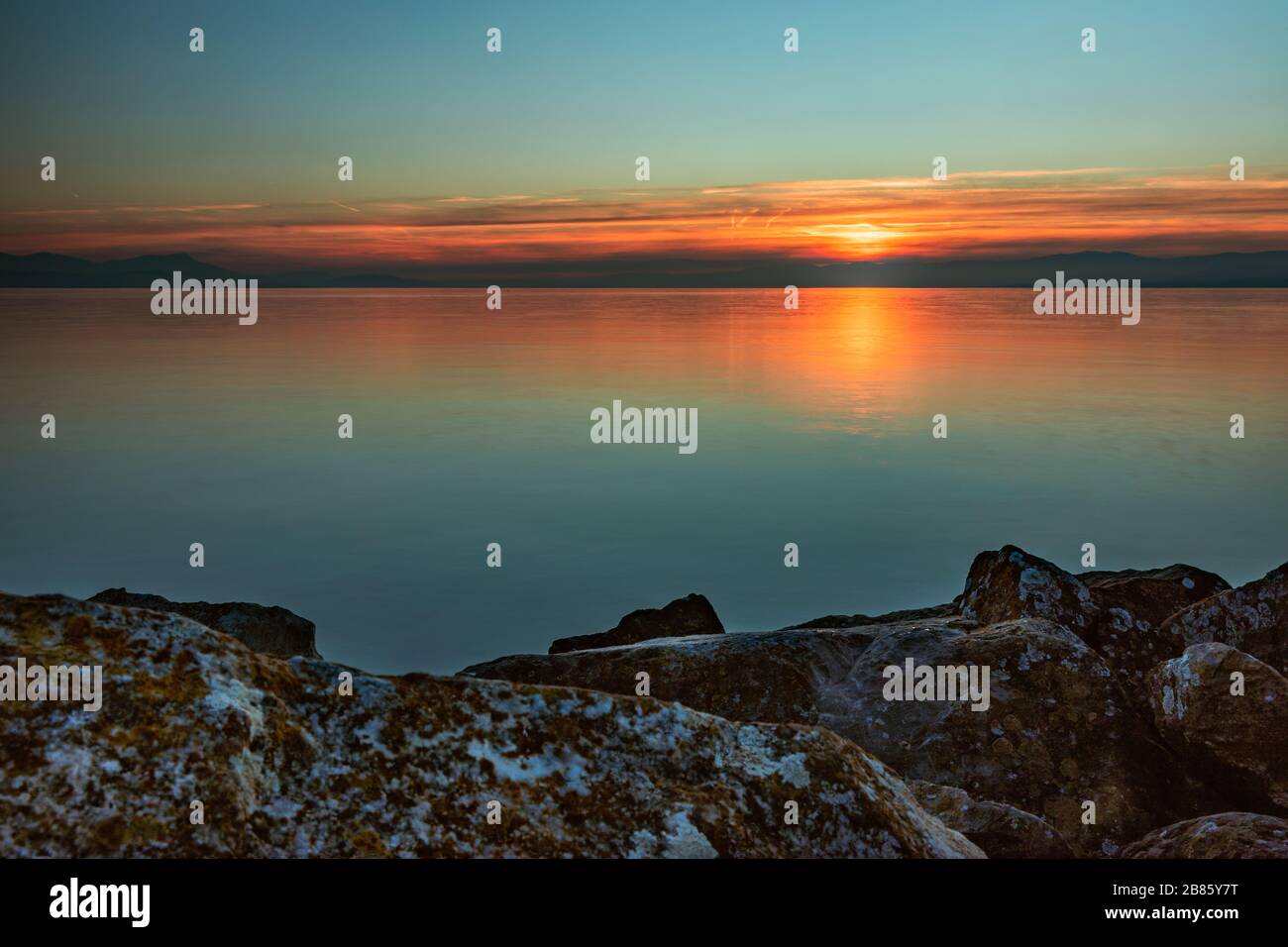 Beautiful sunset on the lake in Lausanne Switzerland Stock Photo