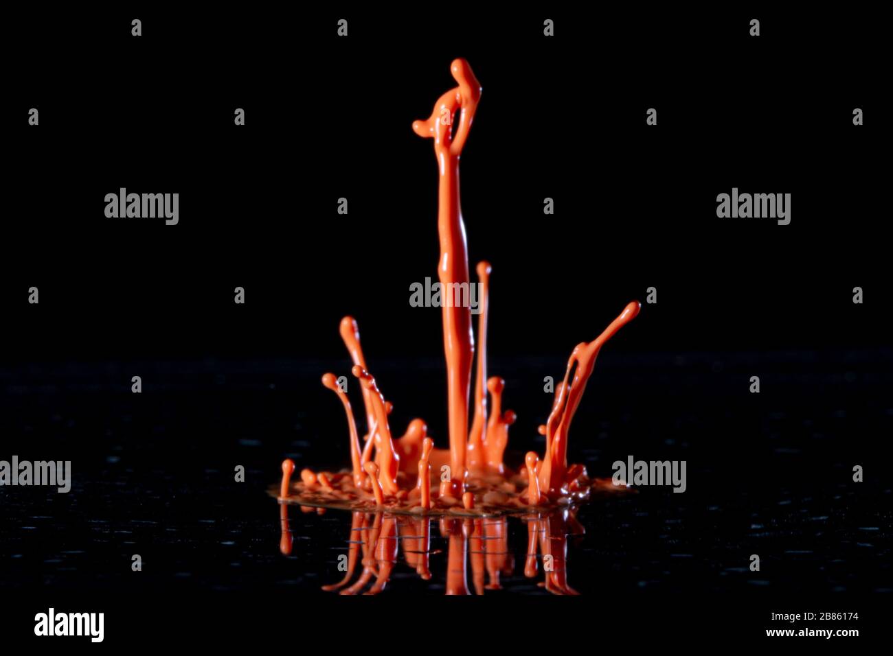 Orange paint splash hi-res stock photography and images - Alamy