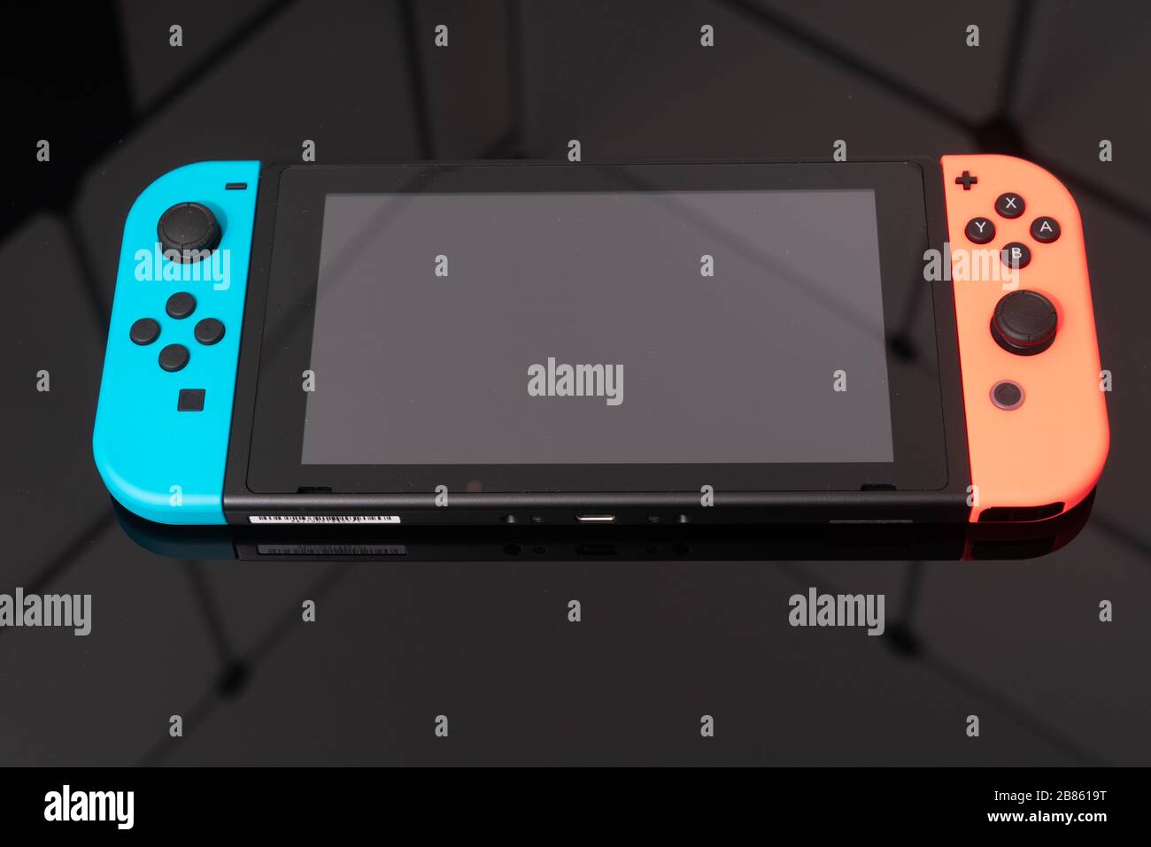 Nintendo Switch video game console developed by Nintendo, released on March  3, 2017 on a black background. Germany, Berlin - June 30, 2019: Nintendo S  Stock Photo - Alamy