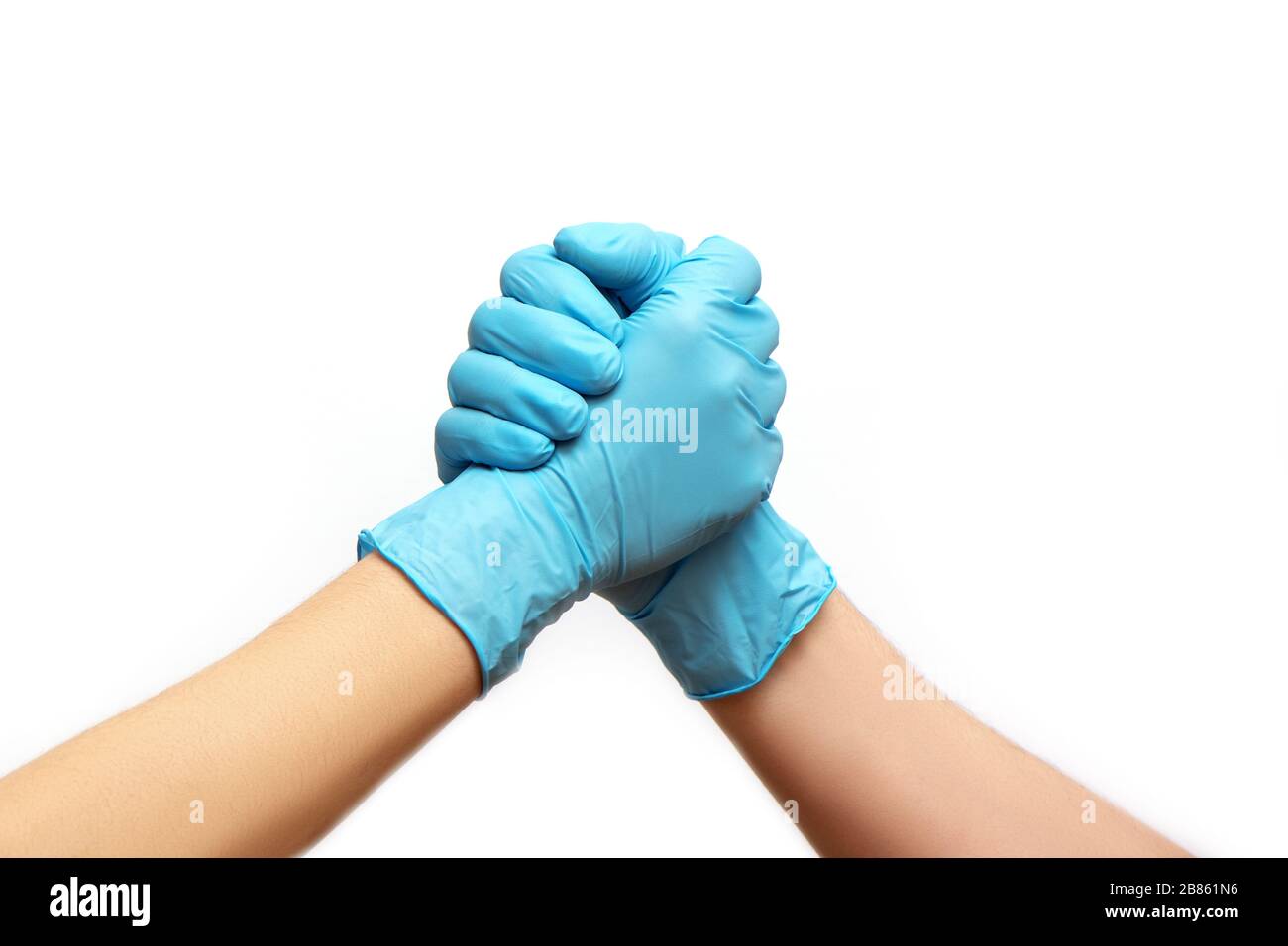 Hands of friends in medical gloves greeting each other isolated on white background. Stock Photo