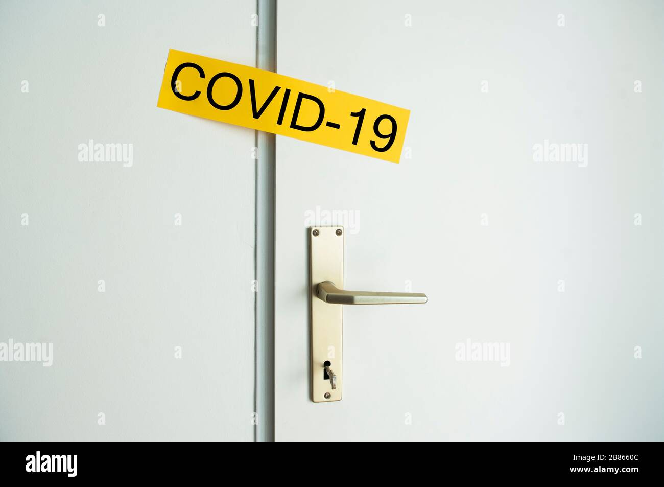 Coronavirus covid-19 quarantine, locked door, closed room, stay at home, protect health. Stock Photo