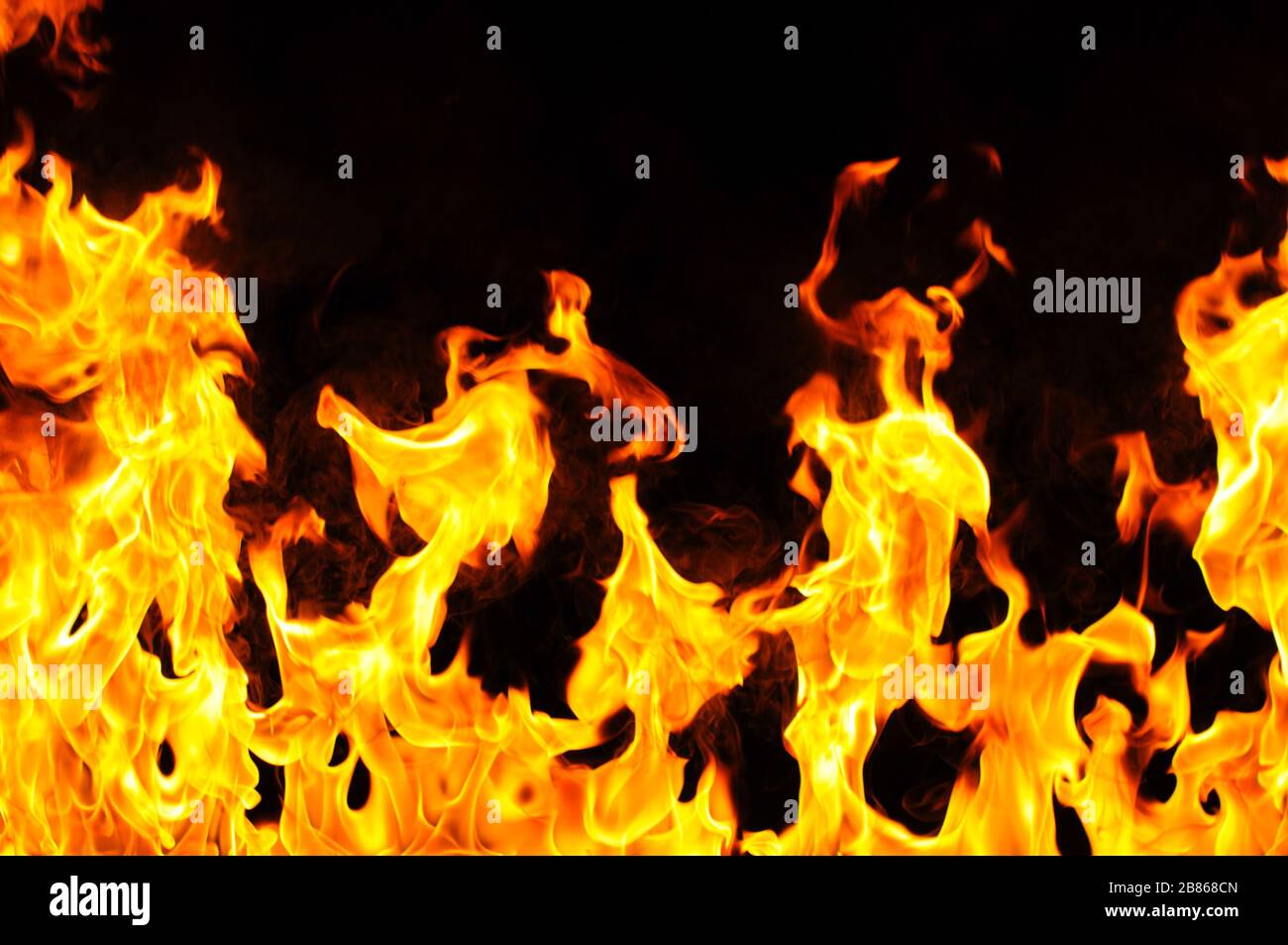 Fire From Bottom Close-up photo of bright burning fire at the bottom of shot. Flame ...