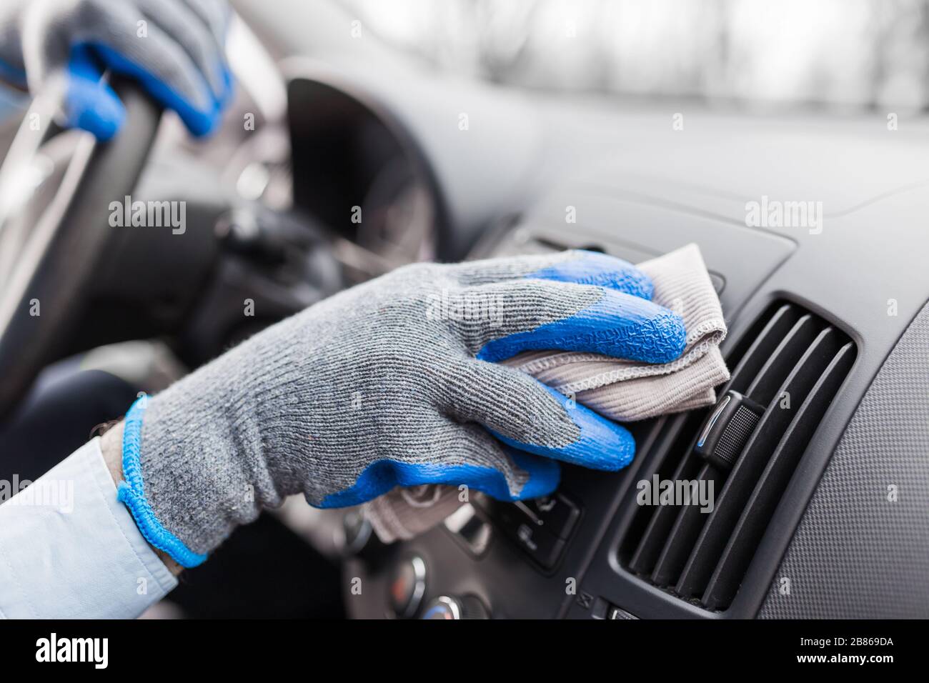 Steam cleaner of car interior. Vapor sterilization. Salon dry cleaning  Stock Photo by svitlanah