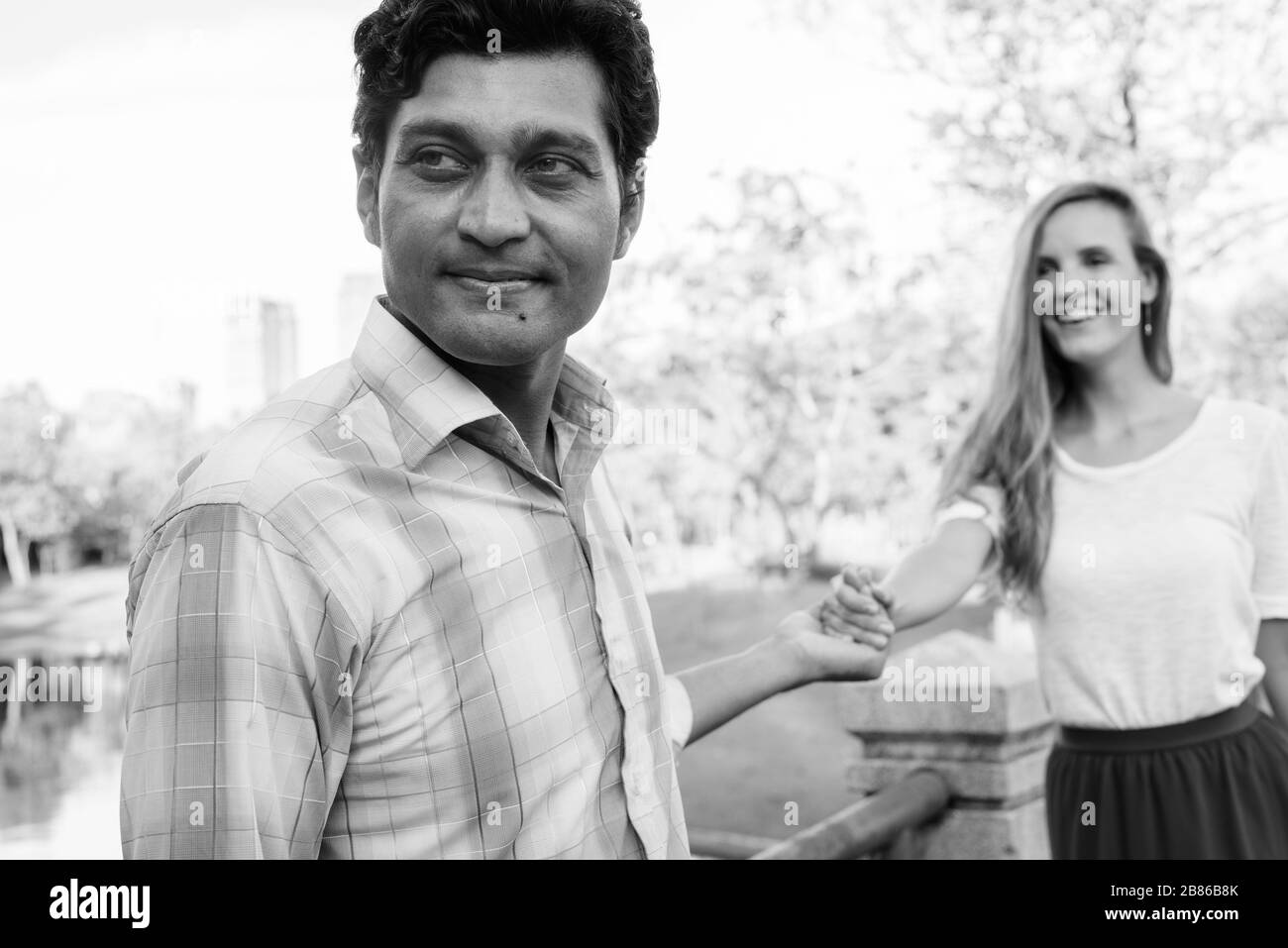 Indian couple holding hands on hi-res stock photography and images - Alamy