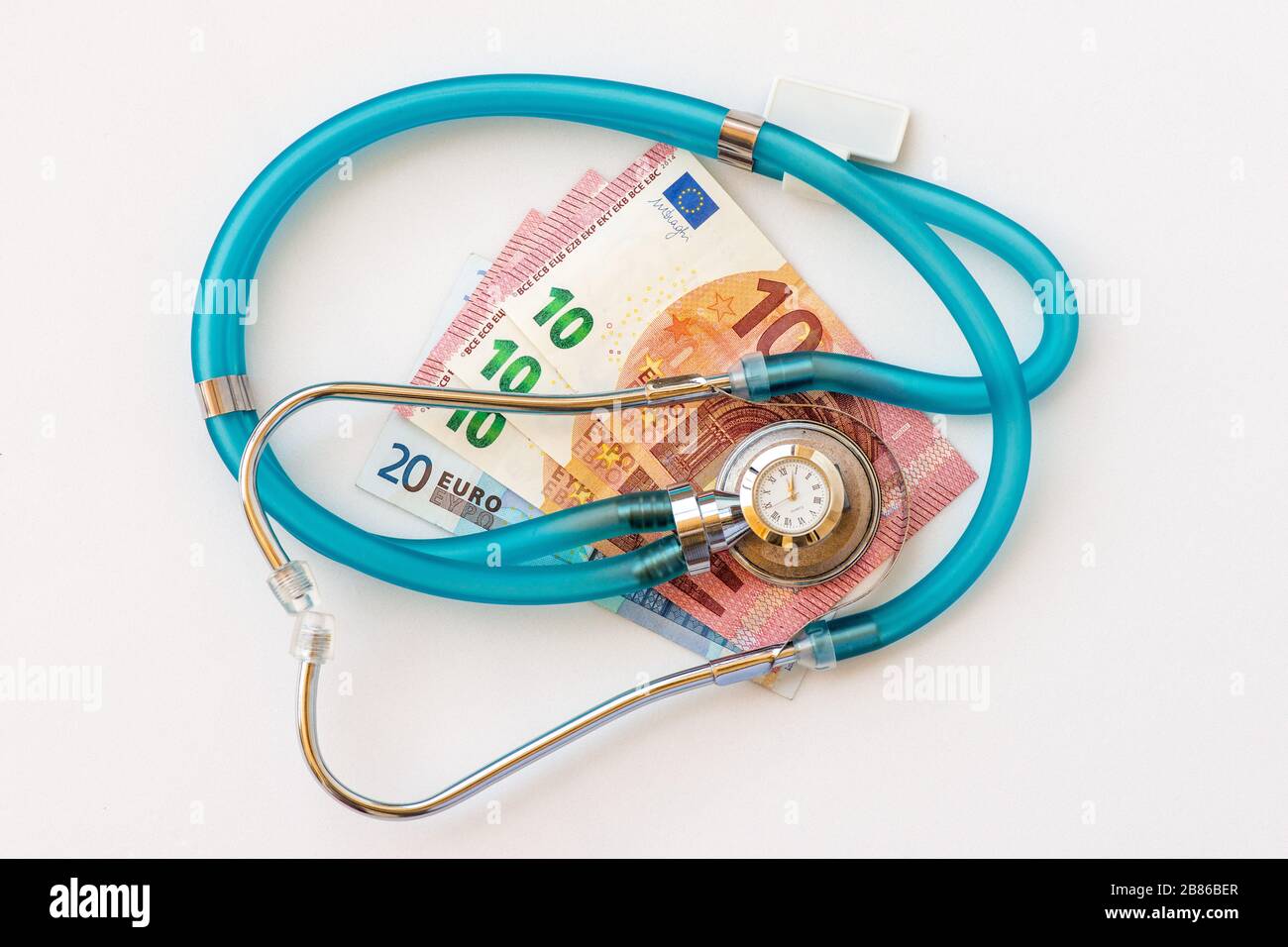 Expensive health treatment. Stethoscope on money background Stock Photo