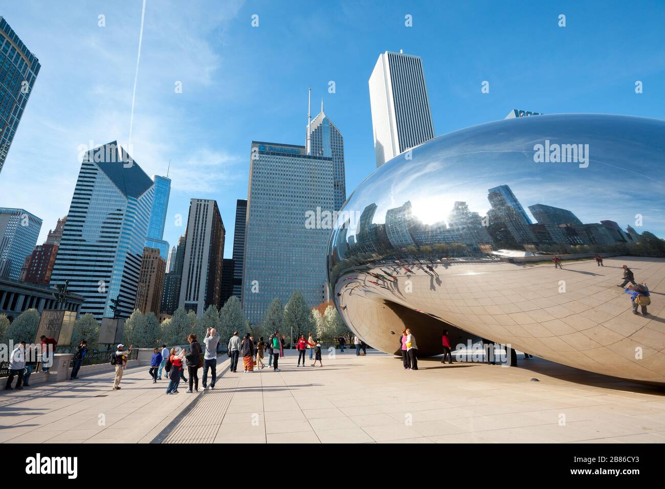 Chicago, Illinois, United States - Skyline of buildings and tourists at Millennium Park at downtown. Stock Photo
