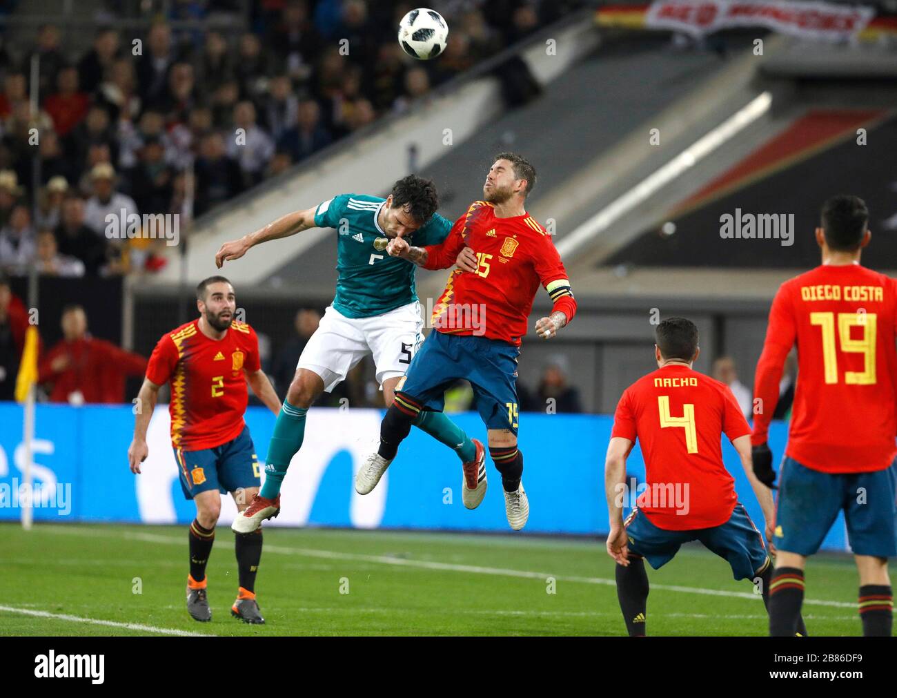 Mats Hummels Of Germany L Jumps For A Header Against Sergio Ramos Of Spain During The Friendly Match Between Germany And Spain Espritarena In Duess Stock Photo Alamy