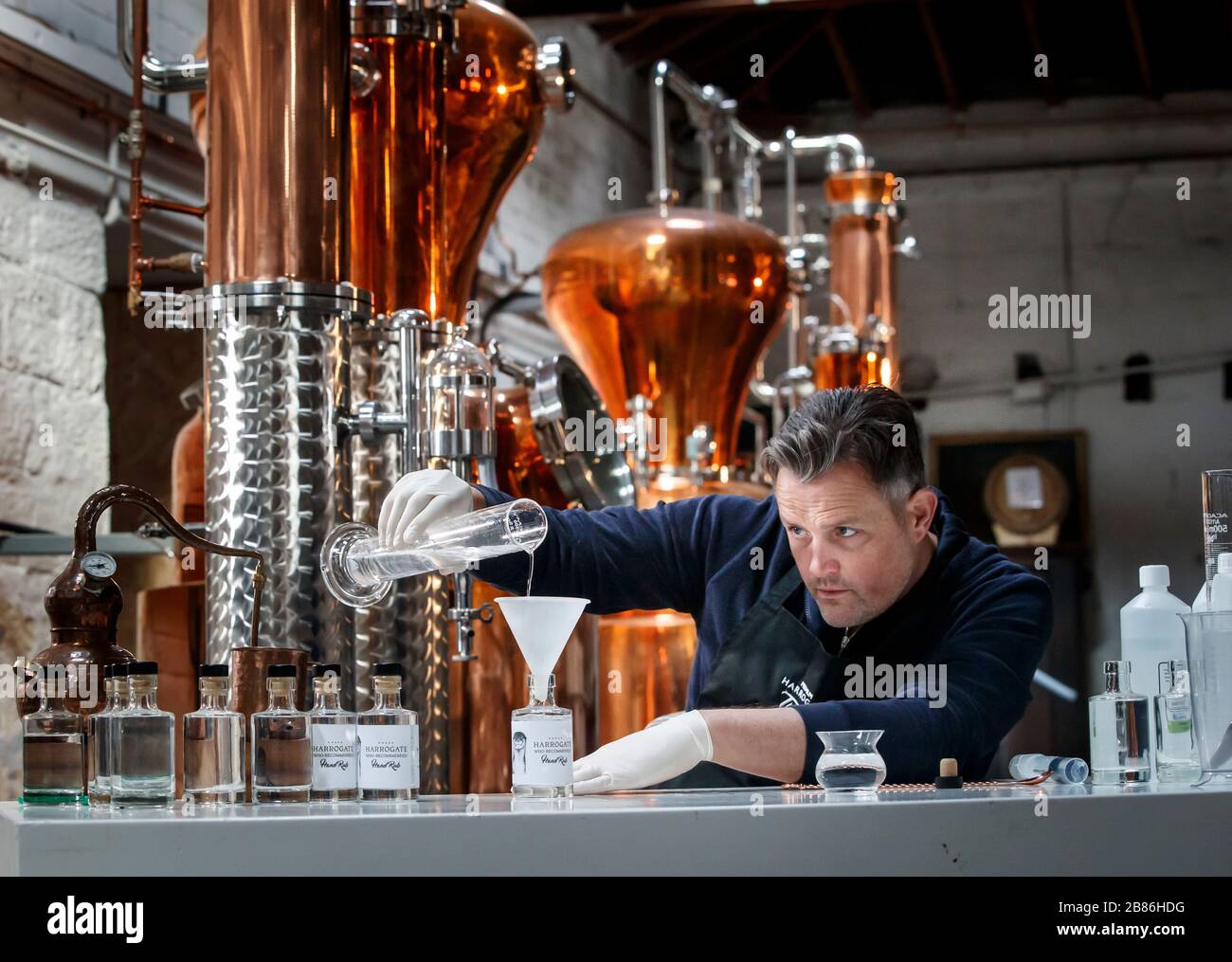Steven Green, founder of Harrogate Tipple, makes hand sanitiser at his gin distillery in North Yorkshire, as his company starts to produce sanitiser in line with World Health Organisation recommendations to boost supply amid the coronavirus crisis. Stock Photo