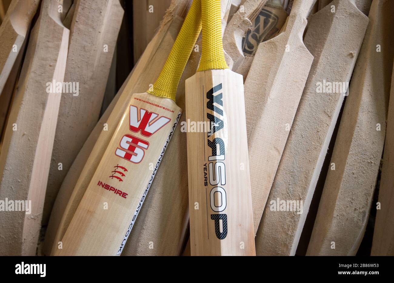 Handmade cricket bats at a workshop at Warsop Stebbing in East Hanningfield, Essex. With the start of the season just weeks away, the ECB, the governing body of cricket have recommend that all forms of recreational cricket are for now suspended. Stock Photo