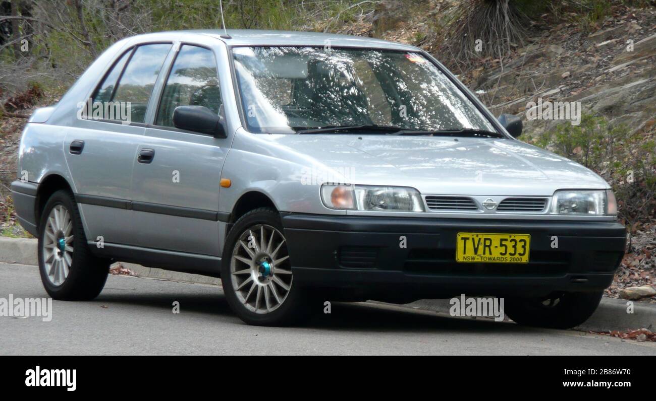 'English: 1994 Nissan Pulsar (N14 CBU) LX Limited 5-door hatchback. Photographed in Grays Point, New South Wales, Australia.; 25 November 2007; Own work; OSX; ' Stock Photo