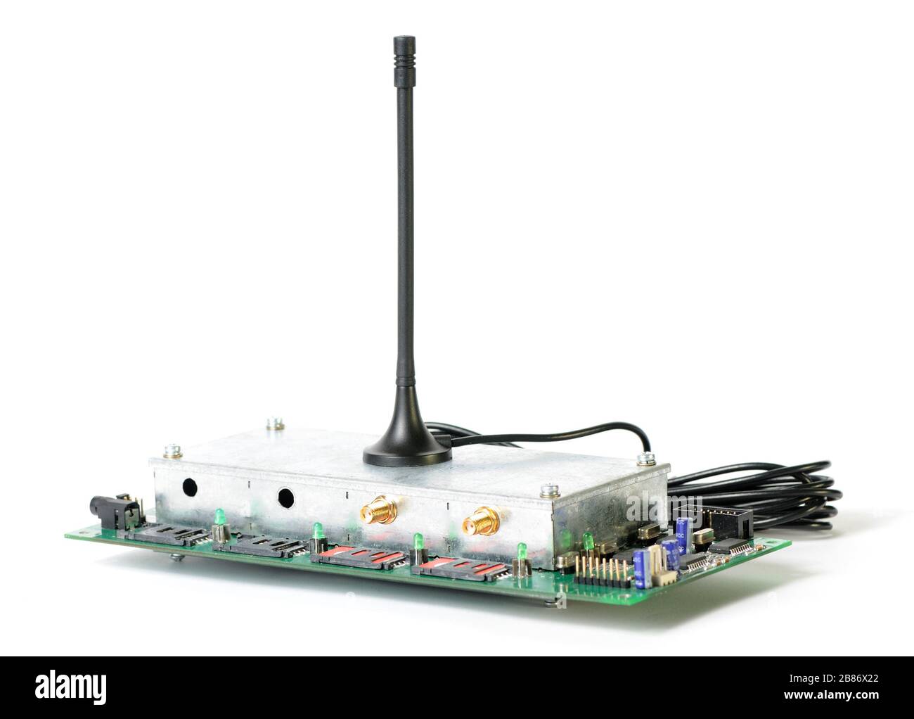 Closeup of a radio device with antenna and wires and a circuit board