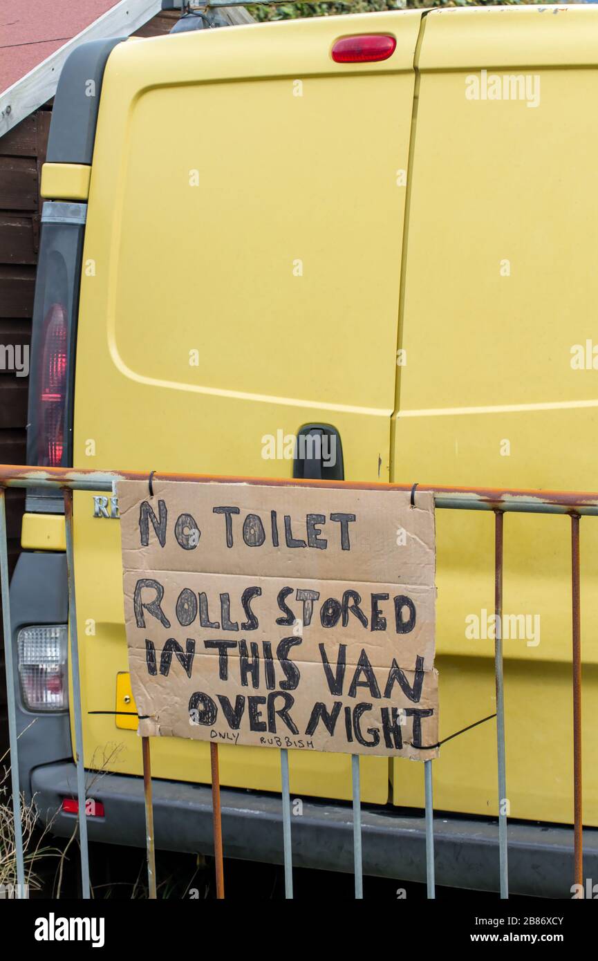 Funny No Toilet Rolls Kept Overnight Sign On Back Of A Yellow Van Showing Problems In UK With