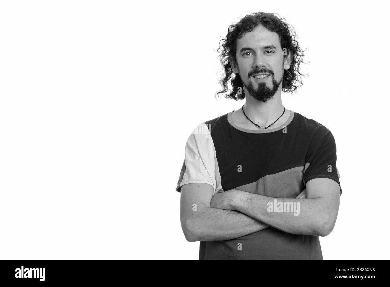 Bearded man with curly hair hi-res stock photography and images - Alamy
