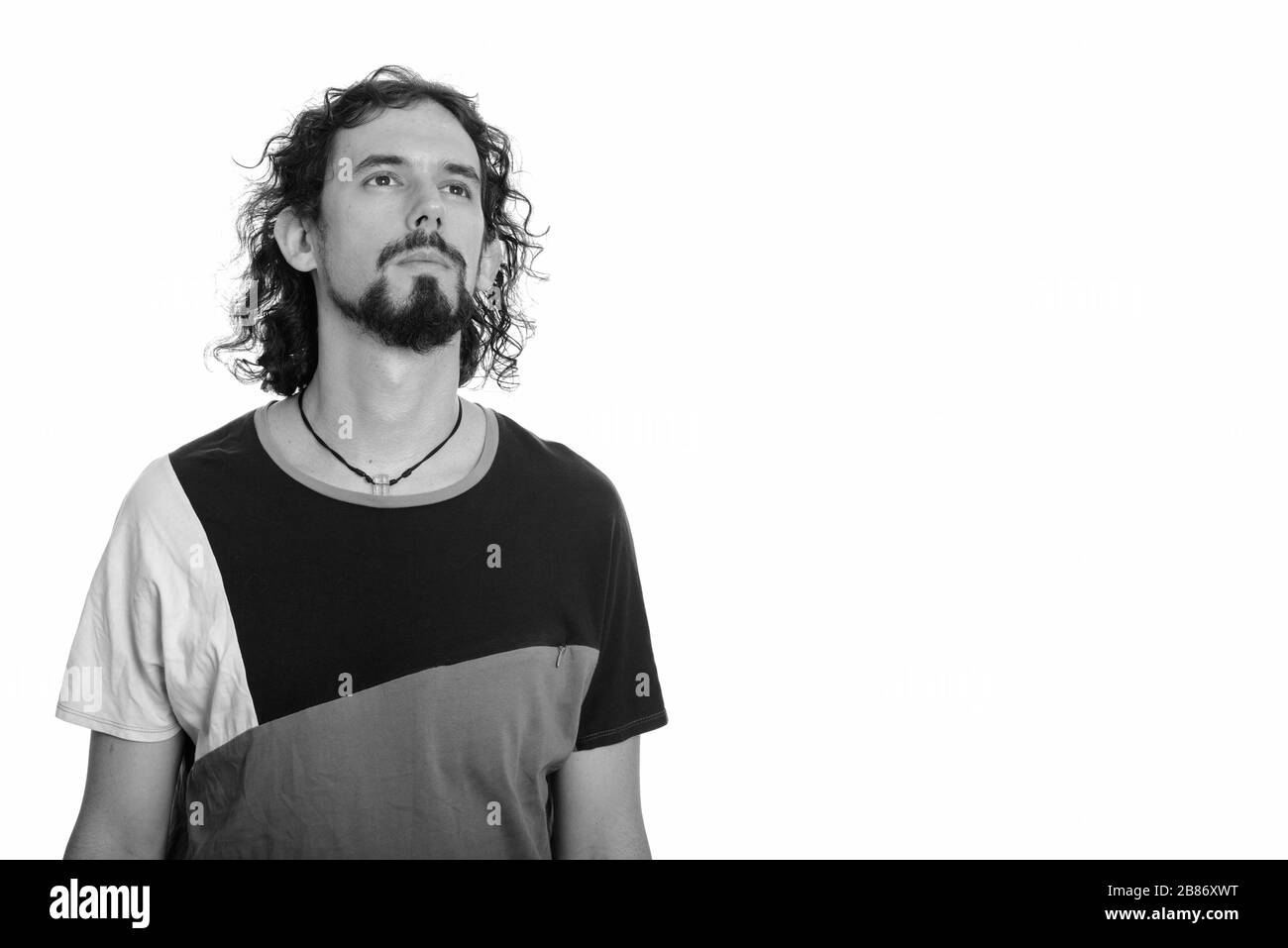 Bearded man with curly hair hi-res stock photography and images - Alamy