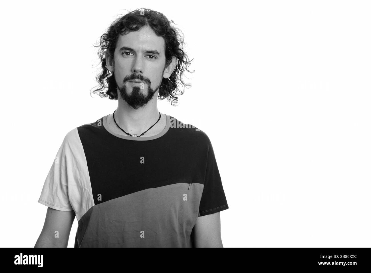 Bearded man with curly hair hi-res stock photography and images - Alamy