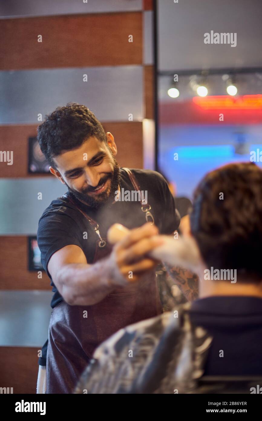 Shaving process of beards in Master makes the client shave