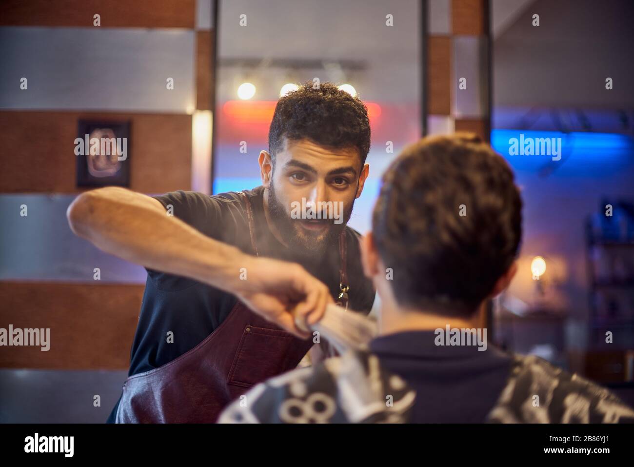 Shaving process of beards in Master makes the client shave