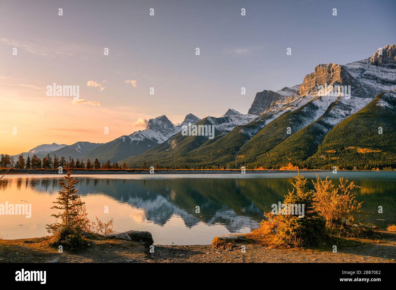 Sunrise on Mount Rundle with blue sky reflection on Rundle Forebay