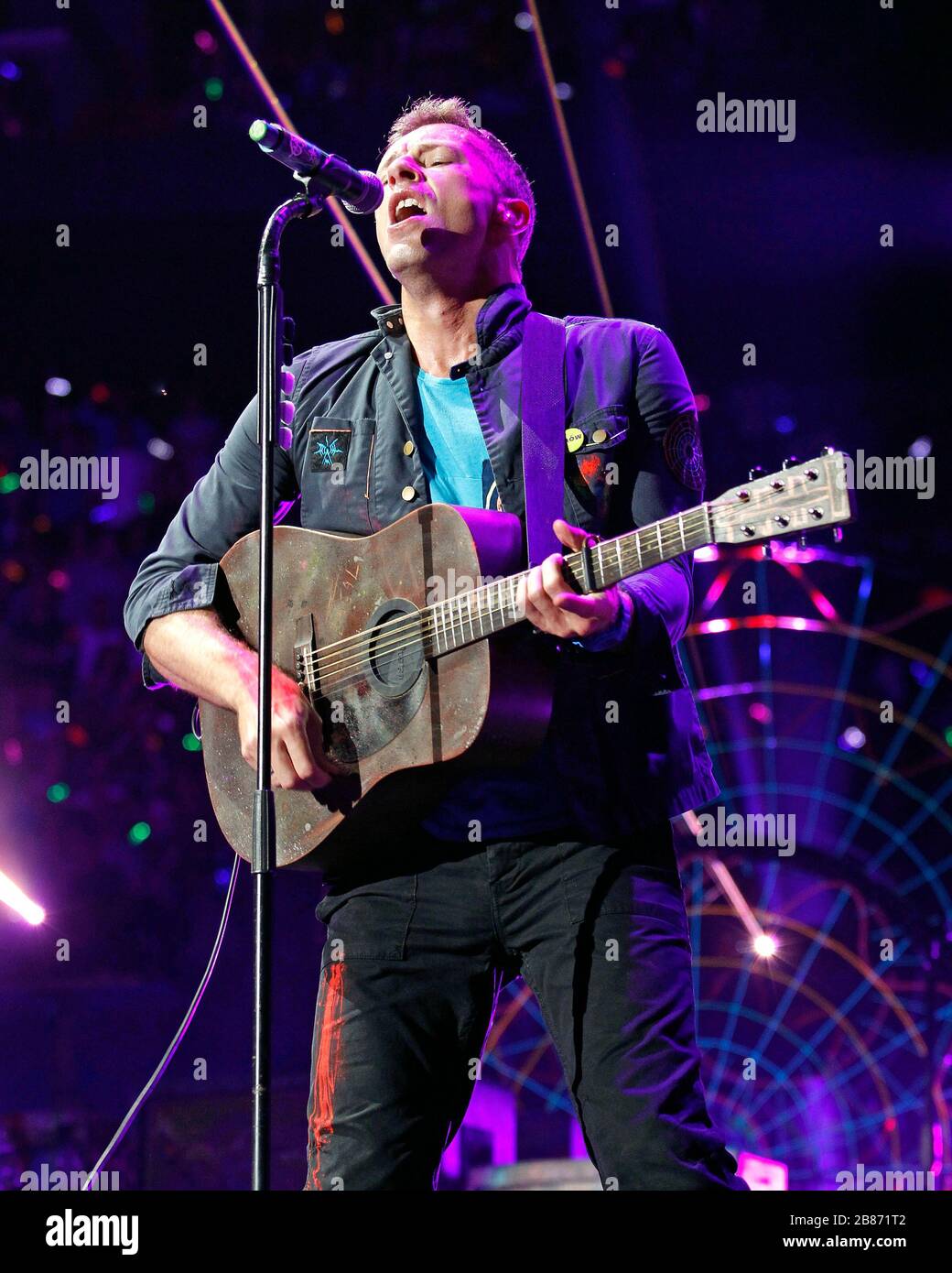Coldplay frontman Chris Martin performs with the rest of the band at the American Airlines Arena in Miami, Florida. Stock Photo