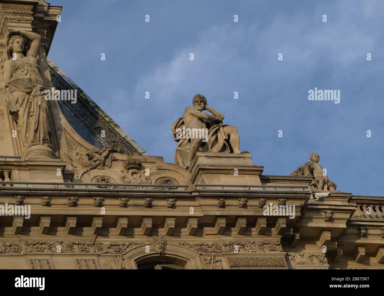 Statue 'L’Industrie' on Pavillon Colbert - Louvre Stock Photo