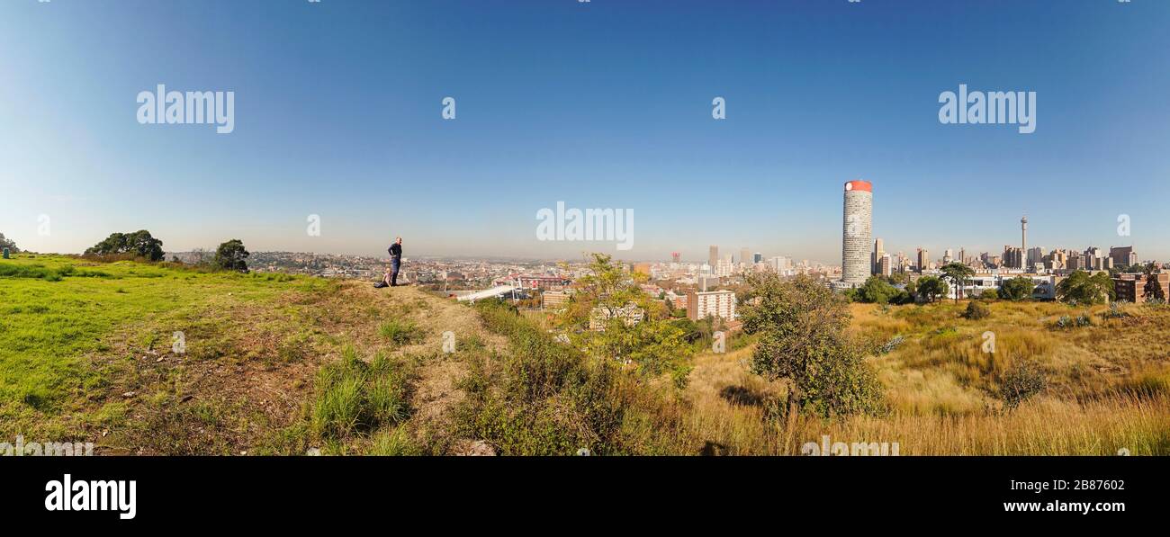 Father and baby son enjoying architecture of downtown of Johannesburg, South Africa Stock Photo