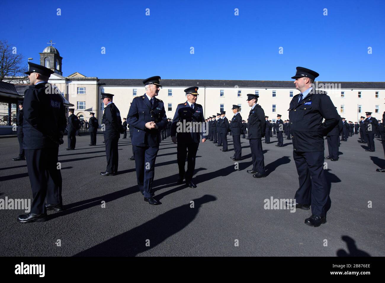 Commissioner Drew Harris and Chief Superintendent Pat Murray inspect the 319 new Gardai during an attestation ceremony at the Garda Training College in Templemore, Co Tipperary. The new Irish police will be deployed to stations nationwide to help respond to the Covid-19 crisis. Stock Photo