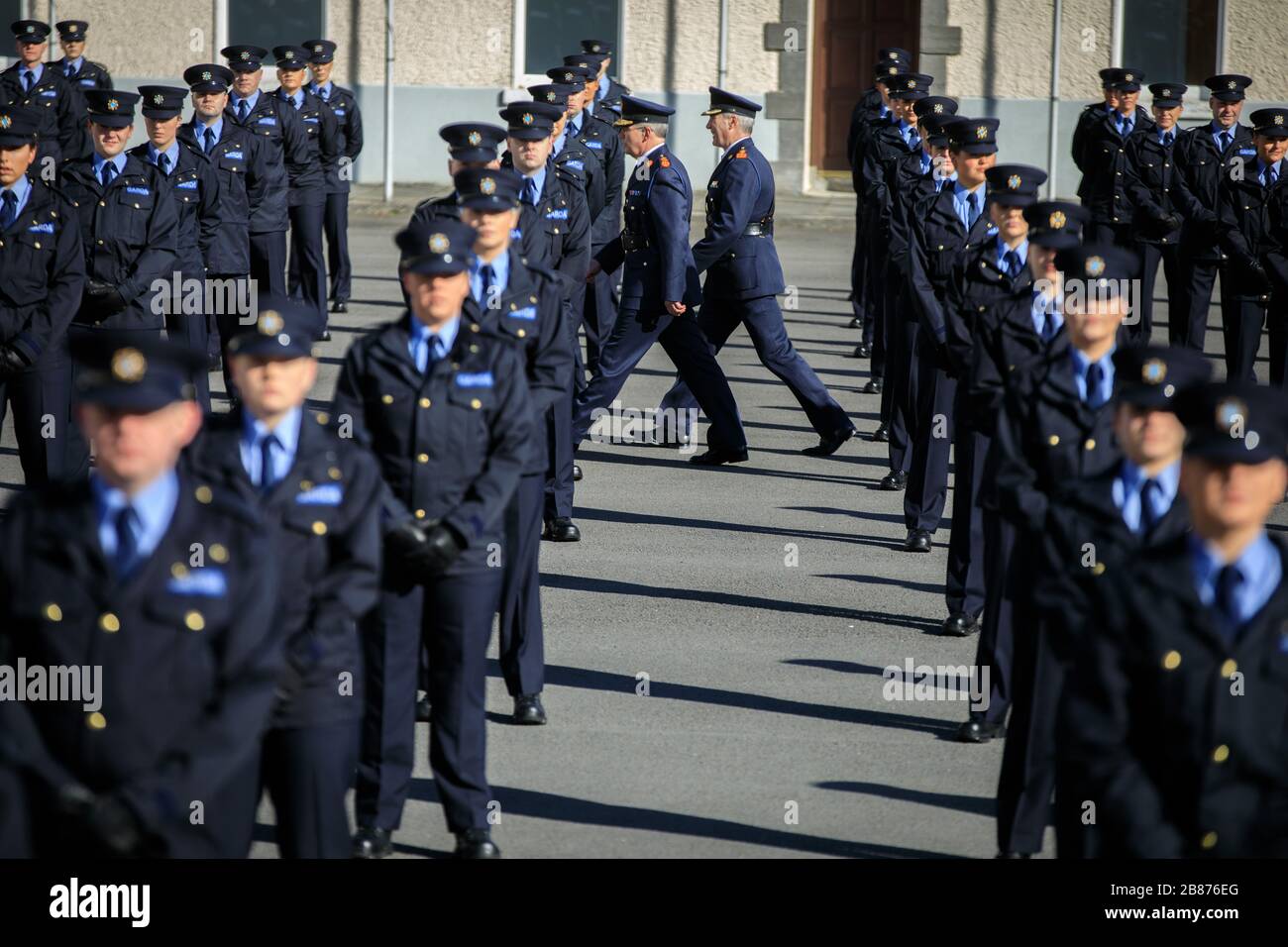 Commissioner Drew Harris and Chief Superintendent Pat Murray inspect the 319 new Gardai during an attestation ceremony at the Garda Training College in Templemore, Co Tipperary. The new Irish police will be deployed to stations nationwide to help respond to the Covid-19 crisis. Stock Photo