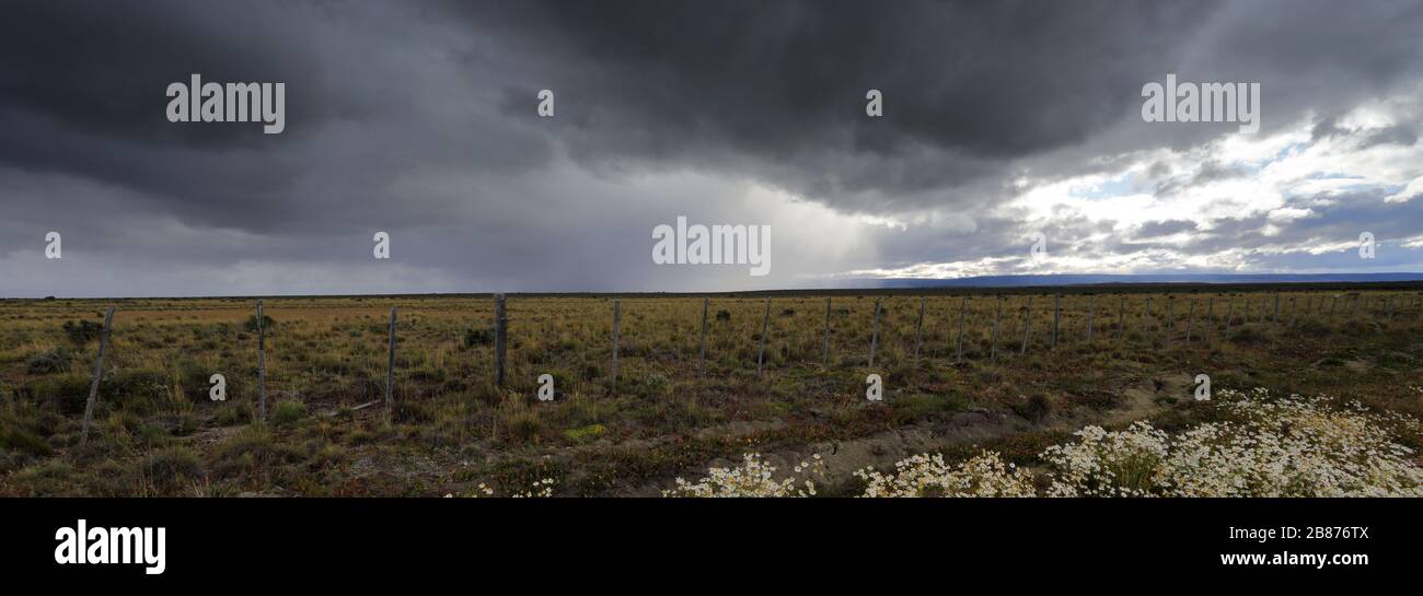 Dramatic clouds over the Patagonia Steppe desert, near Punta Arenas city, Patagonia, Chile, South America Stock Photo