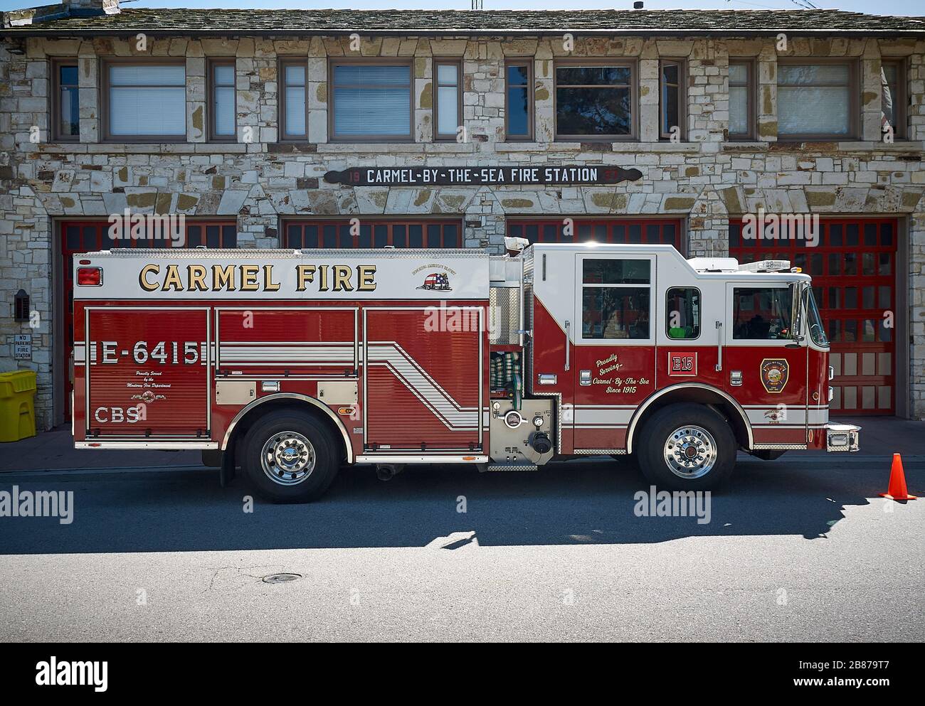 A proper fire truck in front of the fire station of Carmel-by-the- Sea. Stock Photo